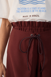 Short Com Sobreposição