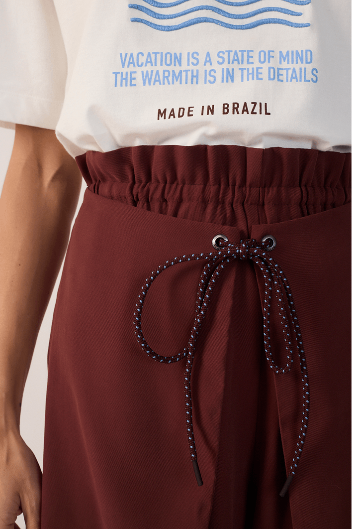 Short Com Sobreposição