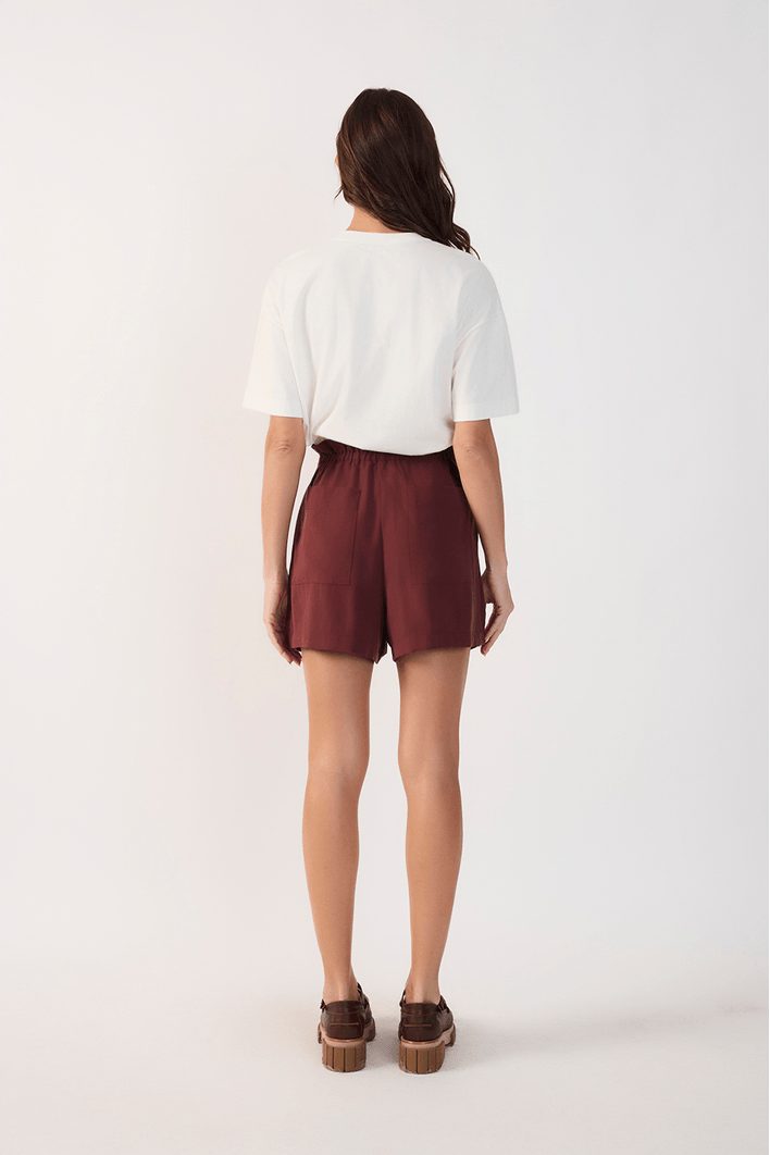 Short Com Sobreposição