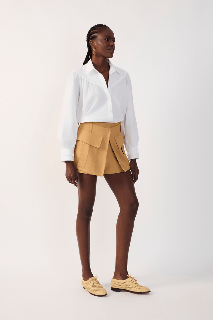 Short Saia Bolsos