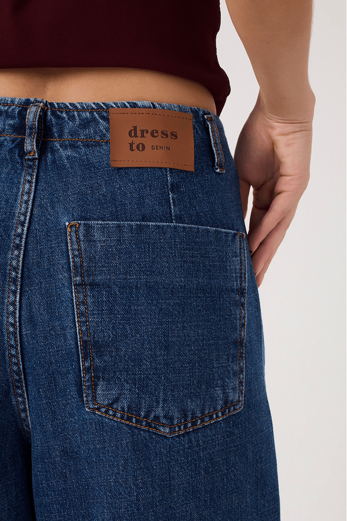 Calça Jeans Pregas