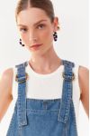 Jardineira Jeans Bolsos