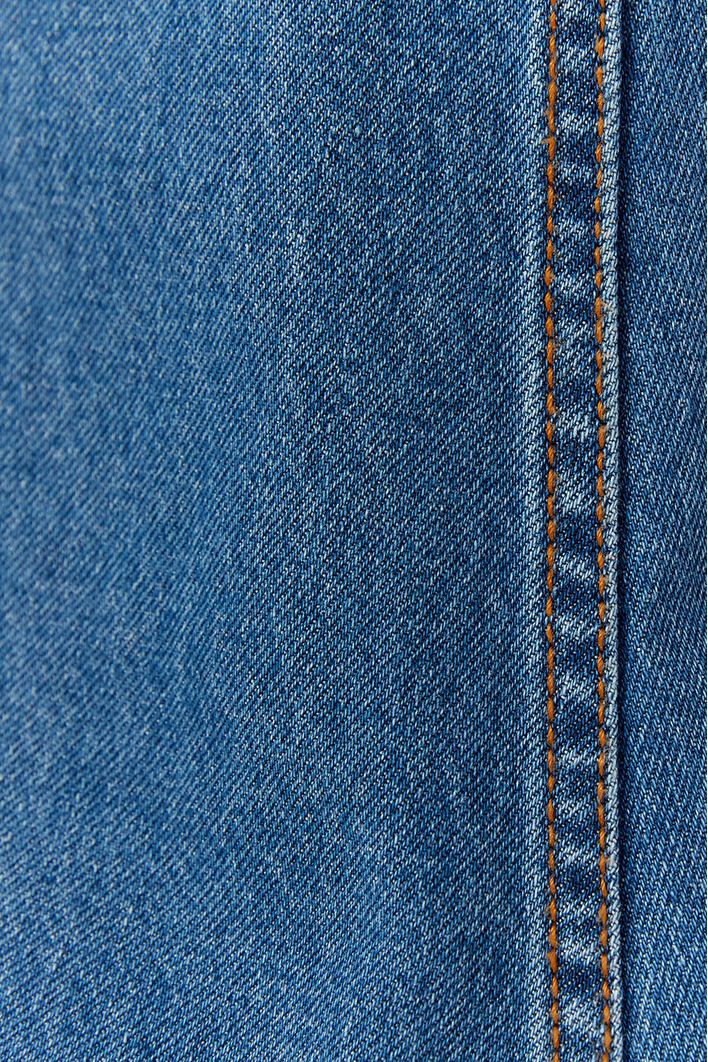 Jardineira Jeans Bolsos