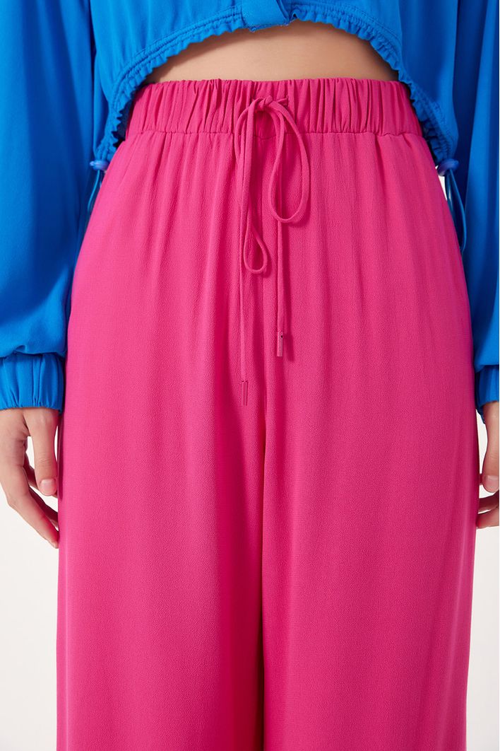 Calça Pantalona Bolsos Laterais